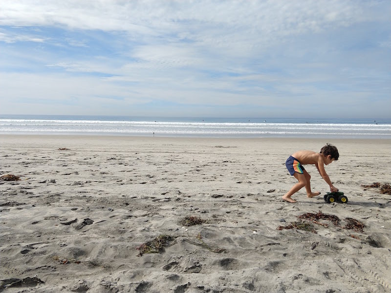 A child playing on the beach